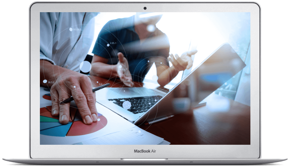 Photo of laptop with team members at work.